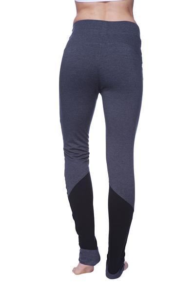 Women’s performance yoga pant with dark gray and black color-blocked snug fit leggings featuring contrasting lower leg panels