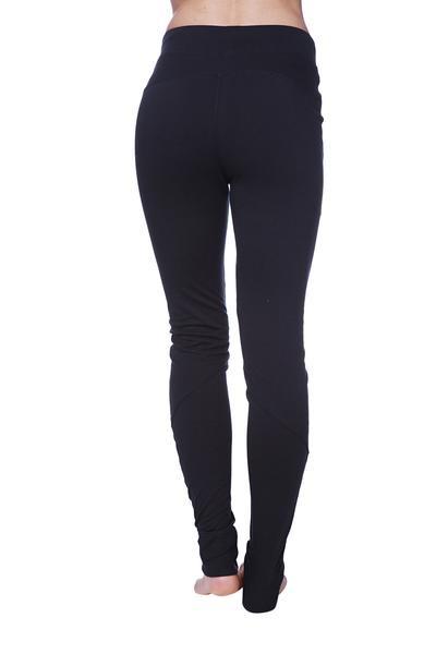 Black form-fitting women’s performance yoga pant made of stretchy fabric for flexible workouts