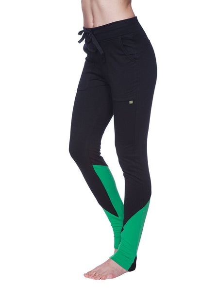 Women’s straight-leg long performance yoga pant in black and green with drawstring waistband for athletic use