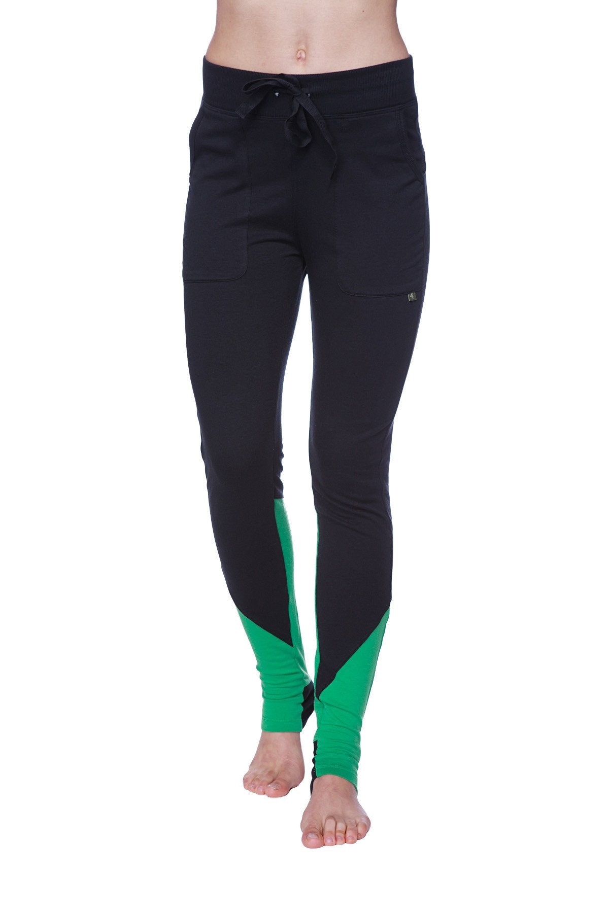 Women’s straight-leg long performance yoga pant in black and green with drawstring waistband for athletic use
