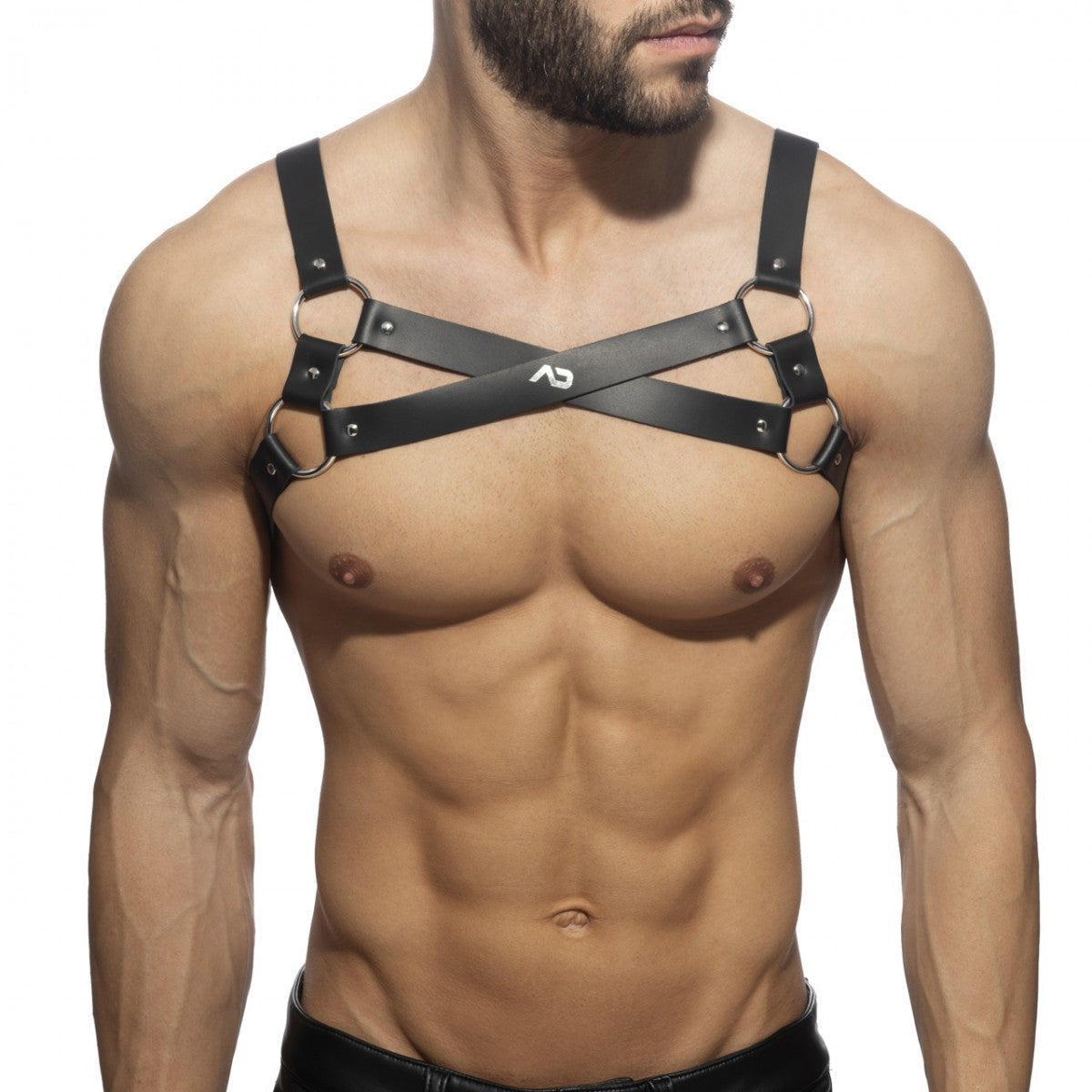 Black leather x-cross leather harness with silver metal rings and studs featuring a cross-over chest design