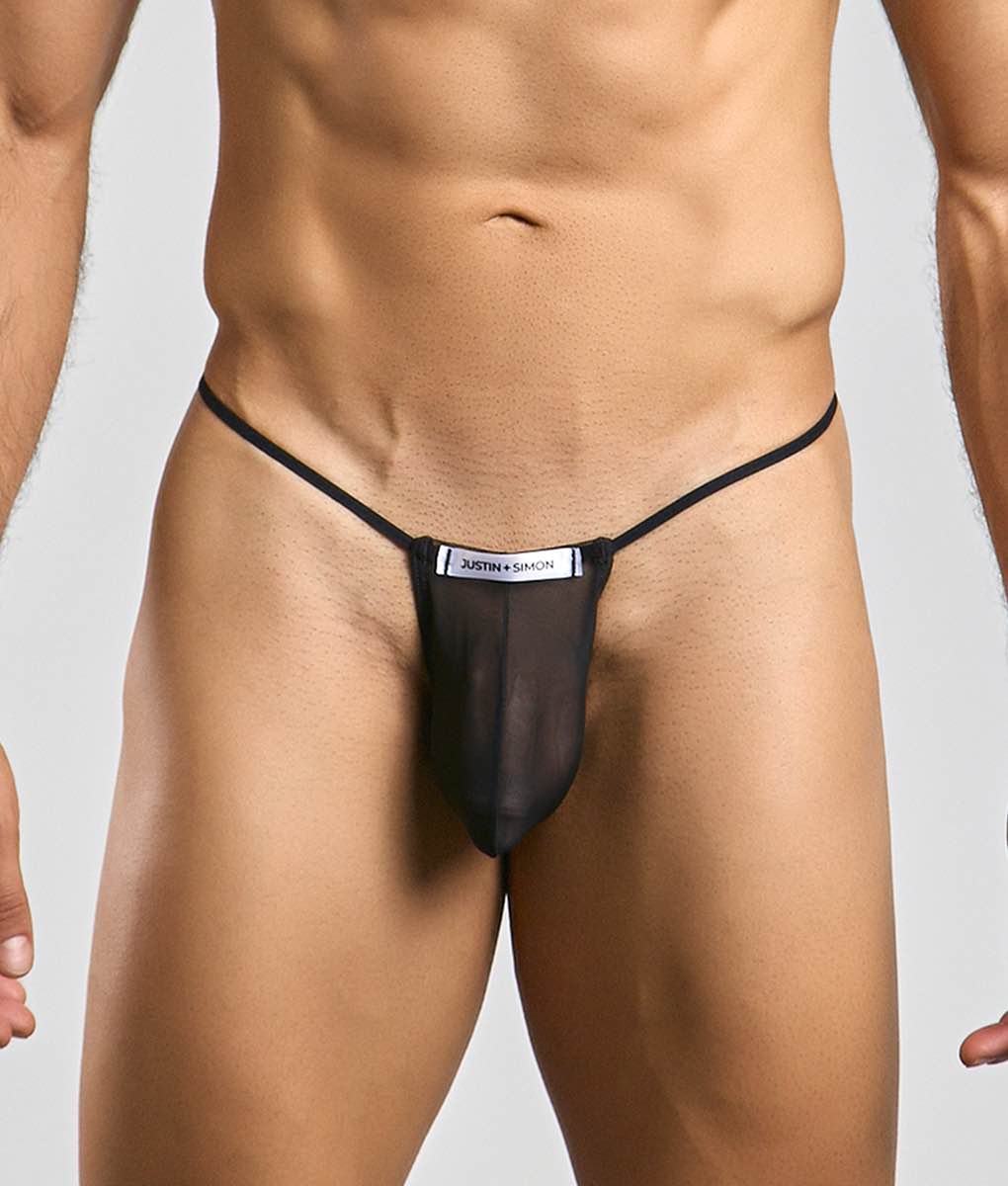 Black sheer mesh thong with thin elastic straps and white justin plus simon label at front classic g-string bulge mesh