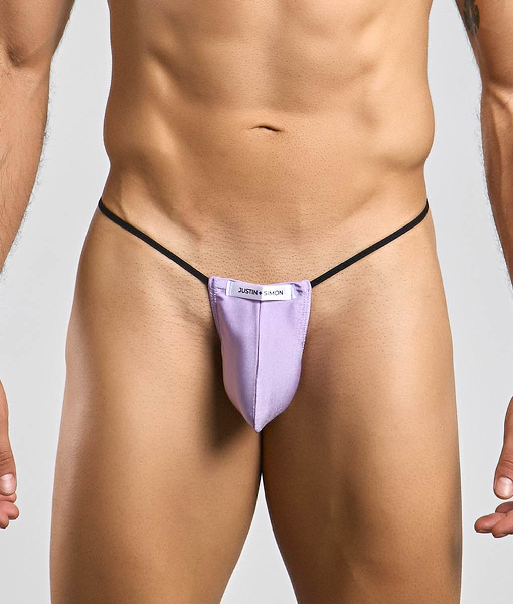 Purple justin simon classic g-string bulge thong with black elastic straps showing front view