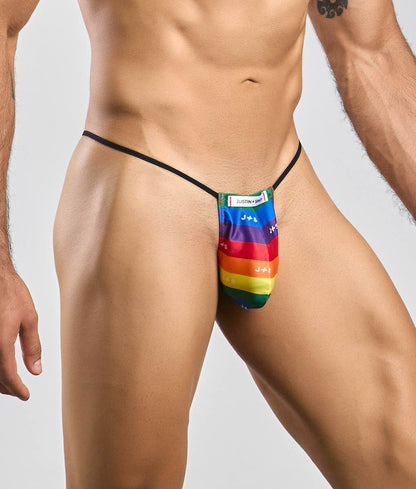 Rainbow-striped fabric thong with black elastic waistband and justin label from the Justin Simon classic G-string bulge collection