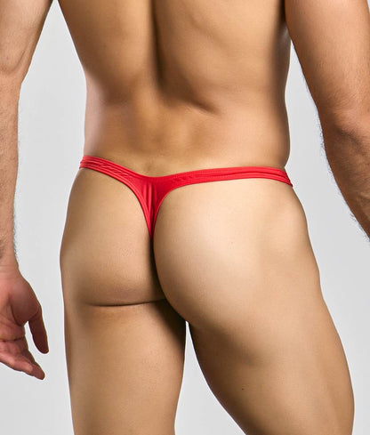 Red Justin plus Simon bulge thong with smooth stretchy fabric and snug fit shown from the back side