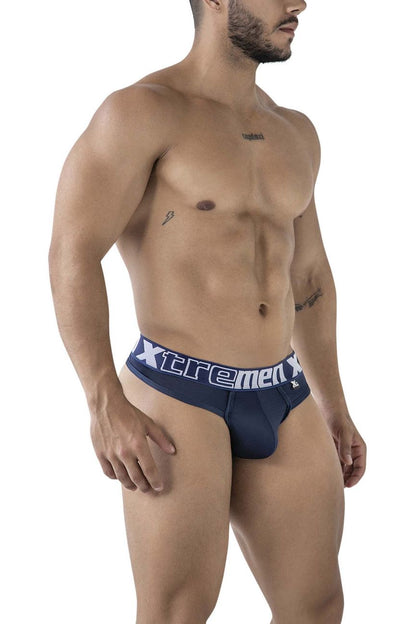 Navy blue Xtremen 91208B microfiber men’s briefs with white waistband lettering showing the back side