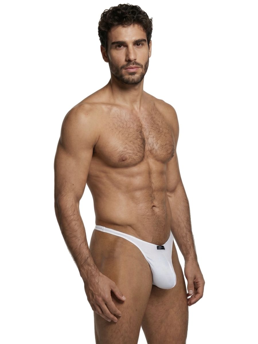 Xtremen white fitted thong with a soft matte finish on a muscular model, isolated against a white background.