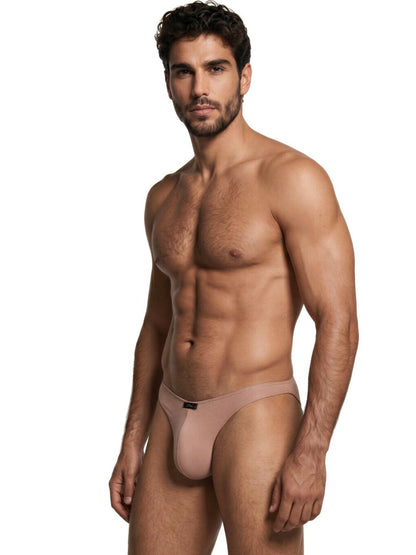 Xtremen beige bikini brief with a smooth, soft-sheen fabric fit on a model.