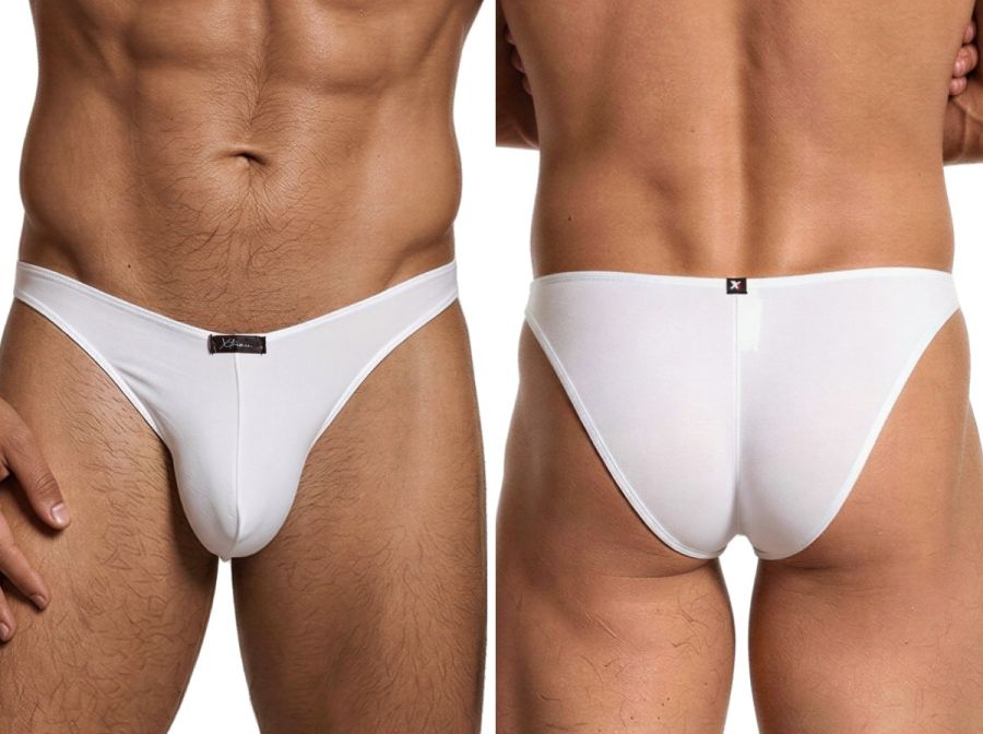 Xtremen white bikini underwear featuring a smooth, matte fabric, slim side straps, and branded logo tags.