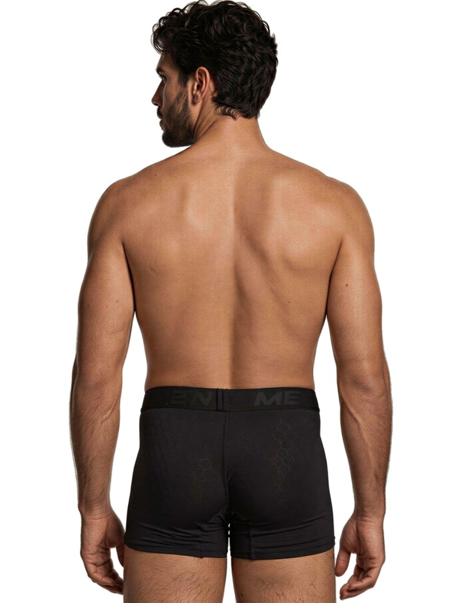 Xtremen black boxer briefs with a subtle tonal honeycomb pattern and branded elastic waistband on a model.