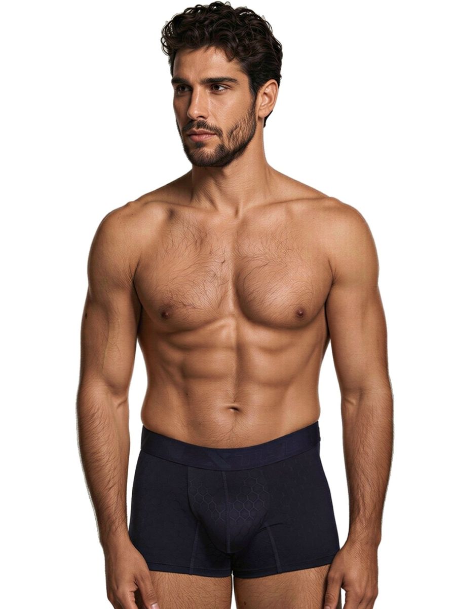 Xtremen navy blue boxer briefs with a subtle honeycomb pattern on the pouch and a fitted, matte finish.