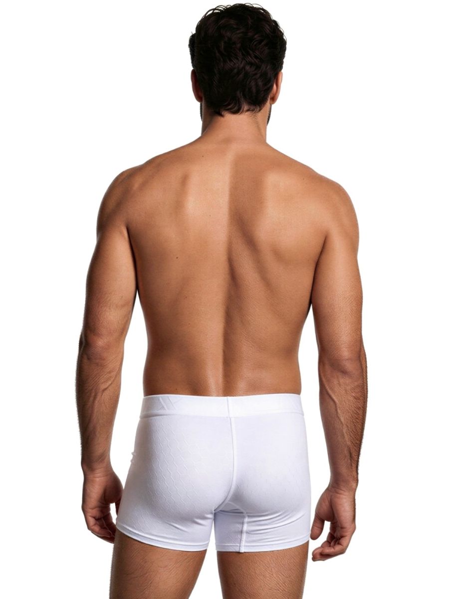 Xtremen white boxer briefs on a man’s back, featuring a subtle geometric pattern and a snug, form-fitting cut.