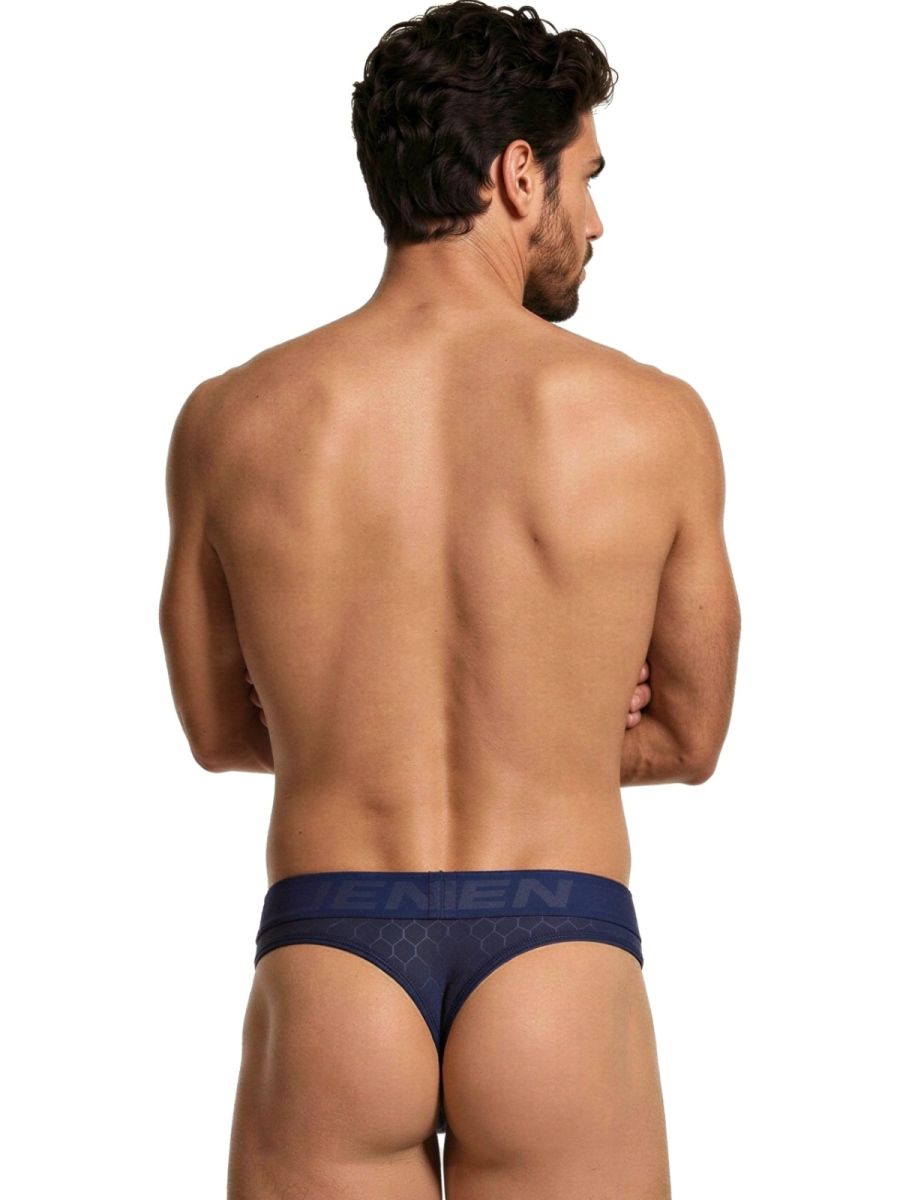 Xtremen navy thong featuring a subtle honeycomb pattern and a branded elastic waistband on a model.