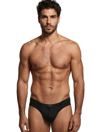 Xtremen black matte fabric bikini brief on a shirtless man.