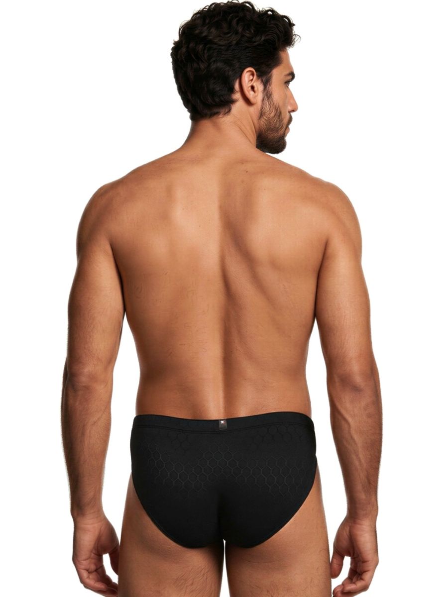 Xtremen men's black brief with a subtle honeycomb textured pattern, shown from the back against a white background.