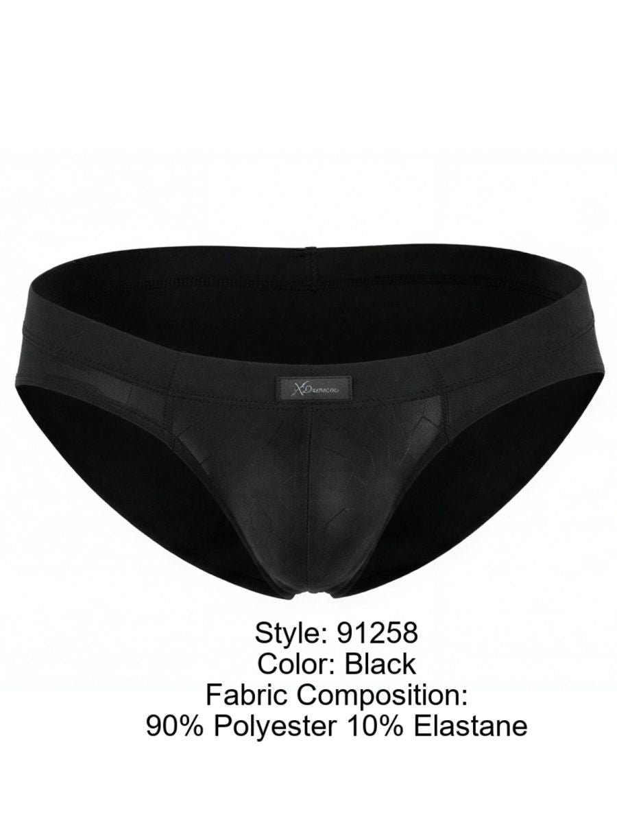 Xtremen black brief with a subtle geometric pattern, fitted pouch, and center brand logo tab.
