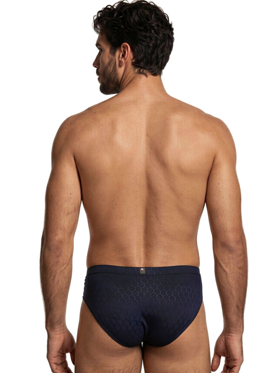 Xtremen navy blue bikini brief with a subtle geometric honeycomb texture pattern, shown from the back.