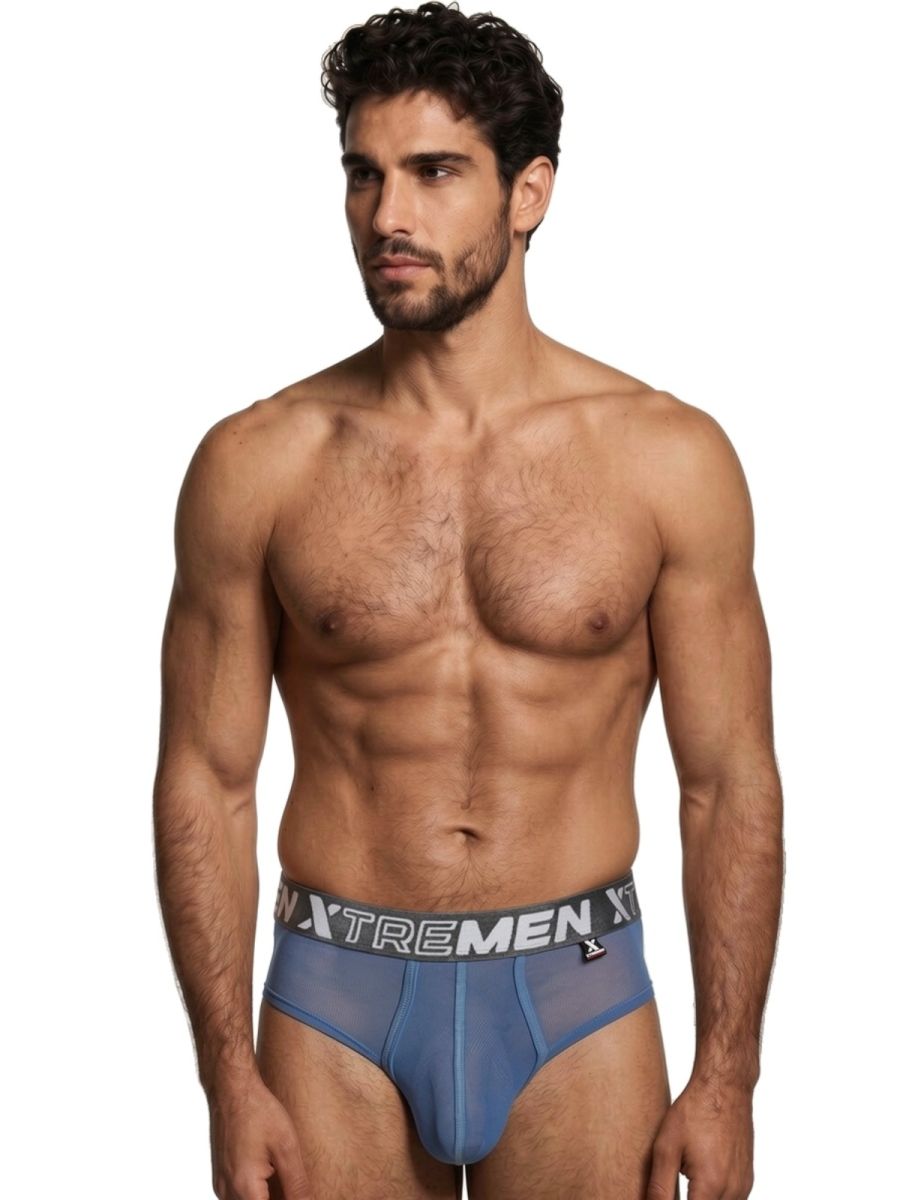 Xtremen blue sheer mesh bikini brief with a grey logo waistband on a fit model.
