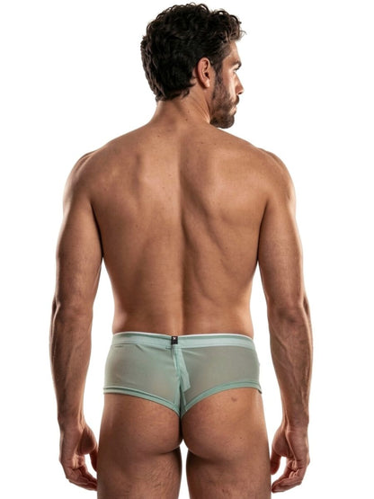 Xtremen light green sheer bikini brief with a slim waistband and center back seam, worn by a man.