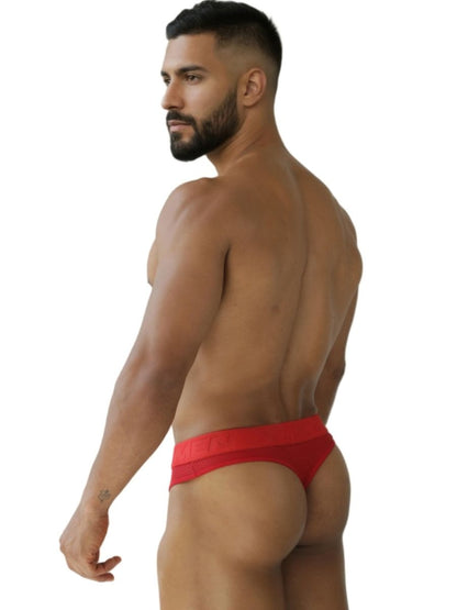 Red xtremen 91268 microfiber mesh thongs with a smooth form fitting design shown from the front side