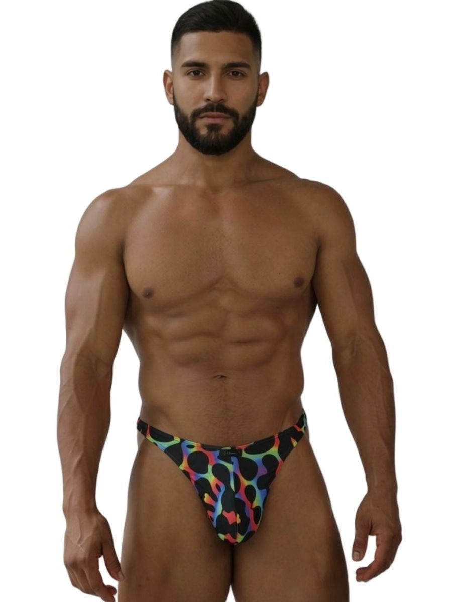 Men’s xtremen 91284 printed microfiber thong in colorful leopard print on black fabric with vibrant mushroom tones