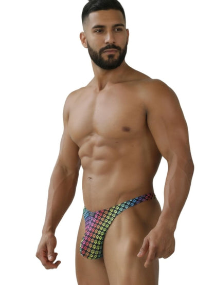 A vibrant xtremen 91284 printed microfiber thong with rainbow geometric paw print pattern in pink blue green and yellow