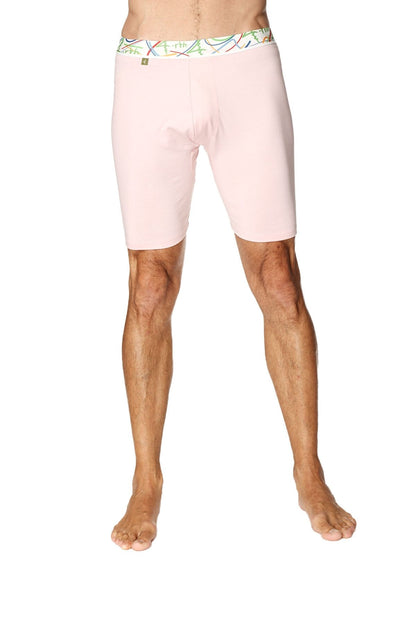 Pink yoga compression shorts for men with colorful patterned waistband designed for support and flexibility