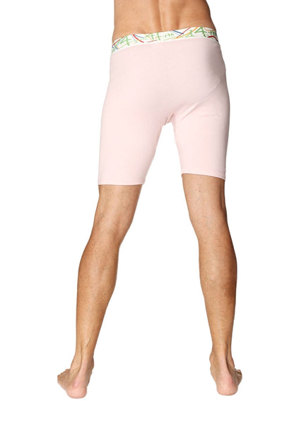 Pink yoga compression shorts featuring a colorful patterned waistband designed for support and comfort during workouts