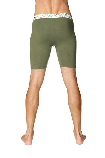 Olive green yoga compression shorts with colorful patterned waistband designed for support and flexibility