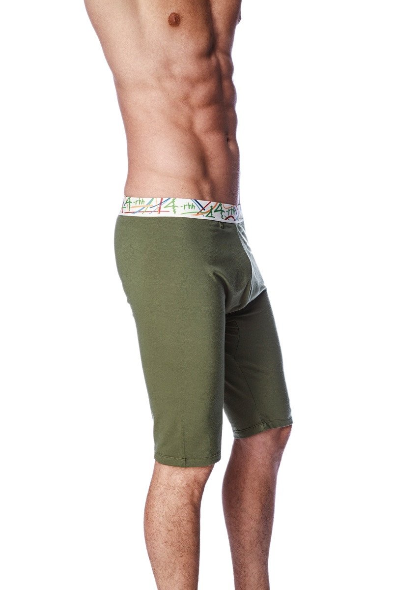 Olive green yoga compression shorts with a colorful patterned waistband designed for active wear and support