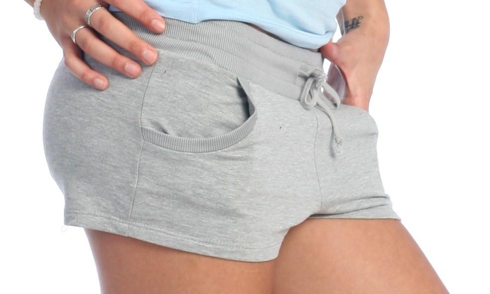 Gray heathered yoga training shorts with drawstring waistband and side pockets for comfortable workouts