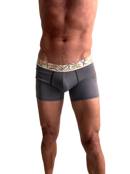 Gray textured zen boxer brief with colorful geometric patterned waistband in charcoal grey stripe design