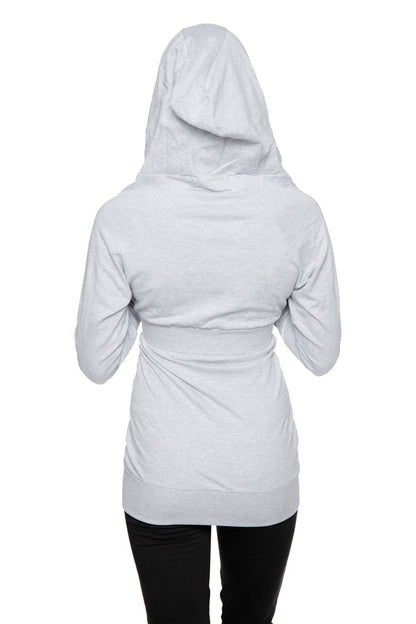 A light gray zip-up long body travel hoodie jacket with a cinched waistband and long sleeves