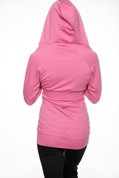 Pink hooded zip-up sweatshirt with cinched waistband and long sleeves travel-ready for berry pink styling