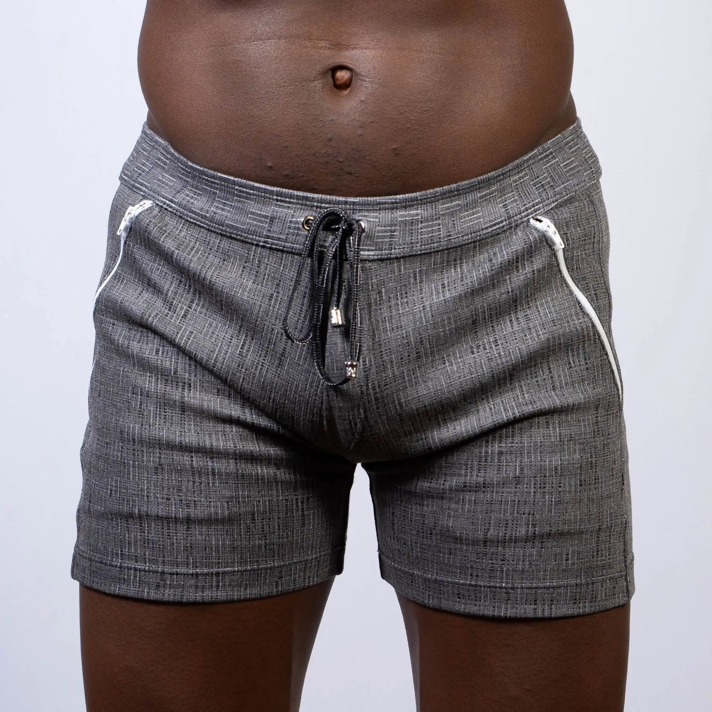 Abstract linen texture gray shorts with white zipper accents and black drawstring waistband for casual wear