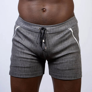 Abstract linen texture gray shorts with white zipper accents and black drawstring waistband for casual wear