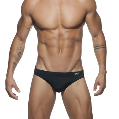 Black ad basic swim brief with subtle logo on waistband designed for comfortable swimwear use