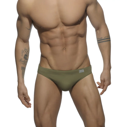 Olive green AD BASIC swim brief with subtle logo on waistband designed for comfortable water use