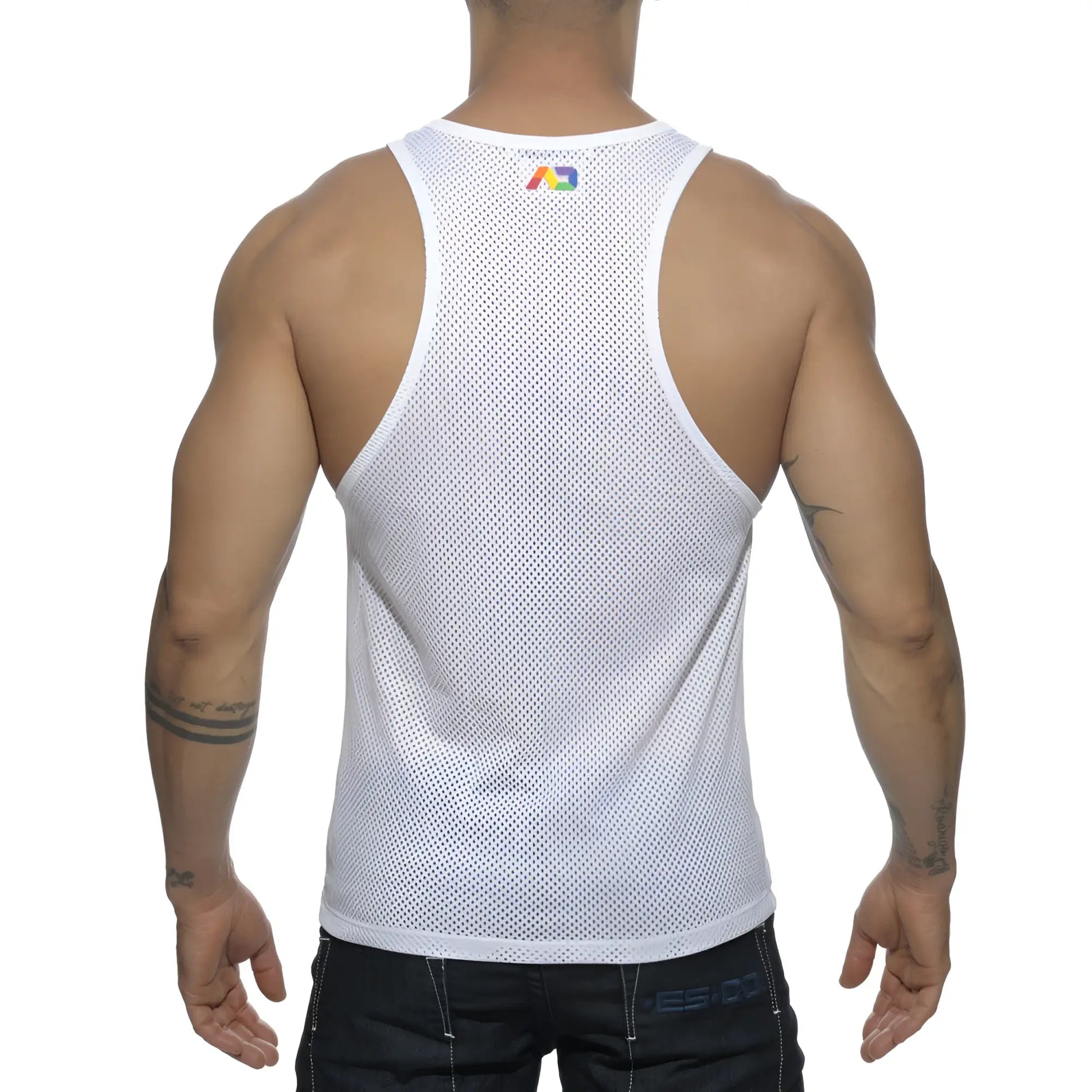 White mesh tank top with a small rainbow logo at the neckline from the ad rainbow mesh tank collection