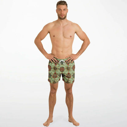 Men's swim shorts in a vibrant mosaic pattern featuring an elastic waistband and drawstring by Maris Equi.