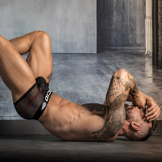 Agacio AGG058 boxer trunk black mesh athletic briefs with red trim and white logo on waistband front side view
