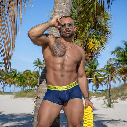Navy blue agacio agg077 fishnet sides boxer trunk with bright yellow elastic waistband and black brand lettering