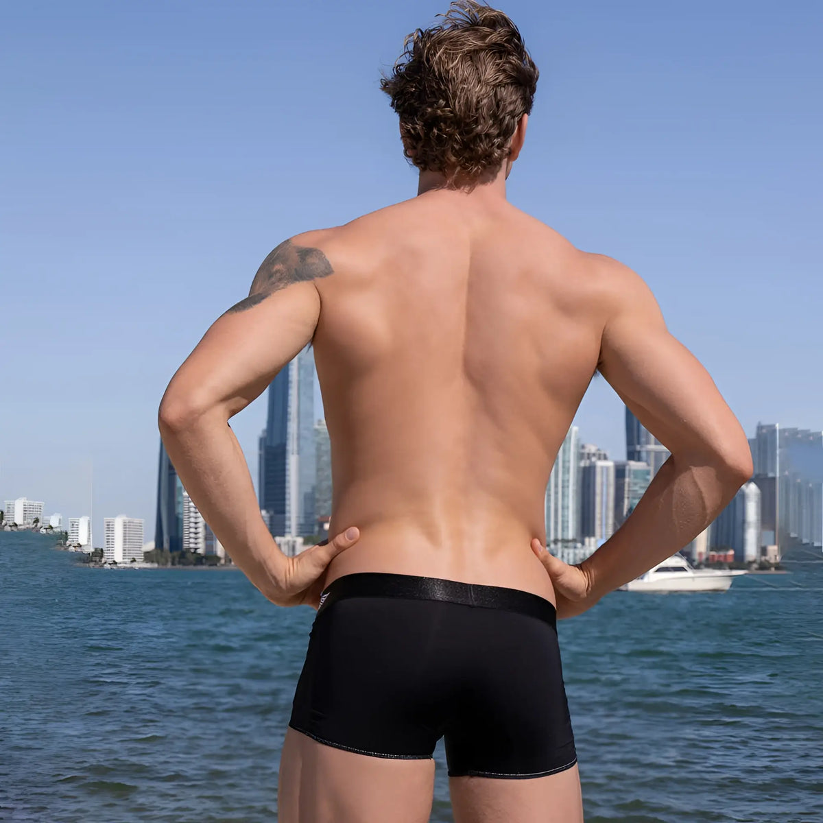 Black agacio agg079 boxer trunk briefs with sleek form-fitting design and subtle edge stitching