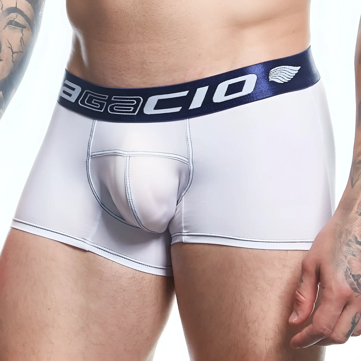 White agacio agg088 boxer trunk briefs with navy blue waistband featuring logo and wing emblem on front side