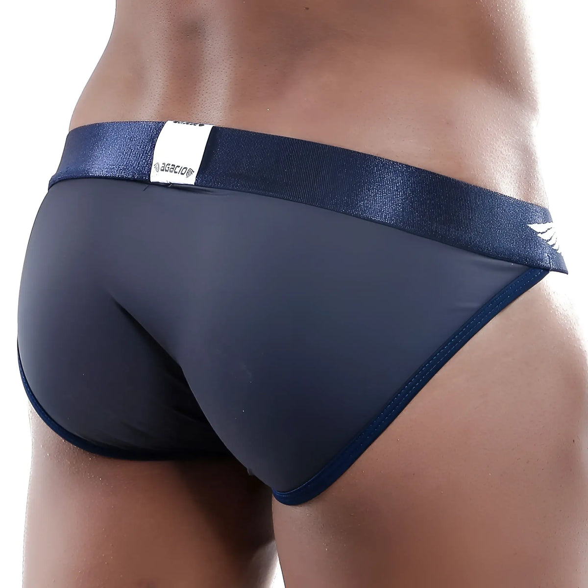 Navy blue agacio agi004 bikini briefs with shiny elastic waistband and white logo tag in front view