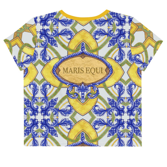 Men's crop tee shirt by Maris Equi featuring a colorful ornate pattern with blue and yellow details on a light background.