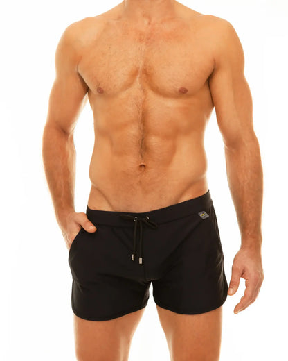 Black along slit swim short trunks with drawstring waistband and small side logo ideal for swimming and beachwear