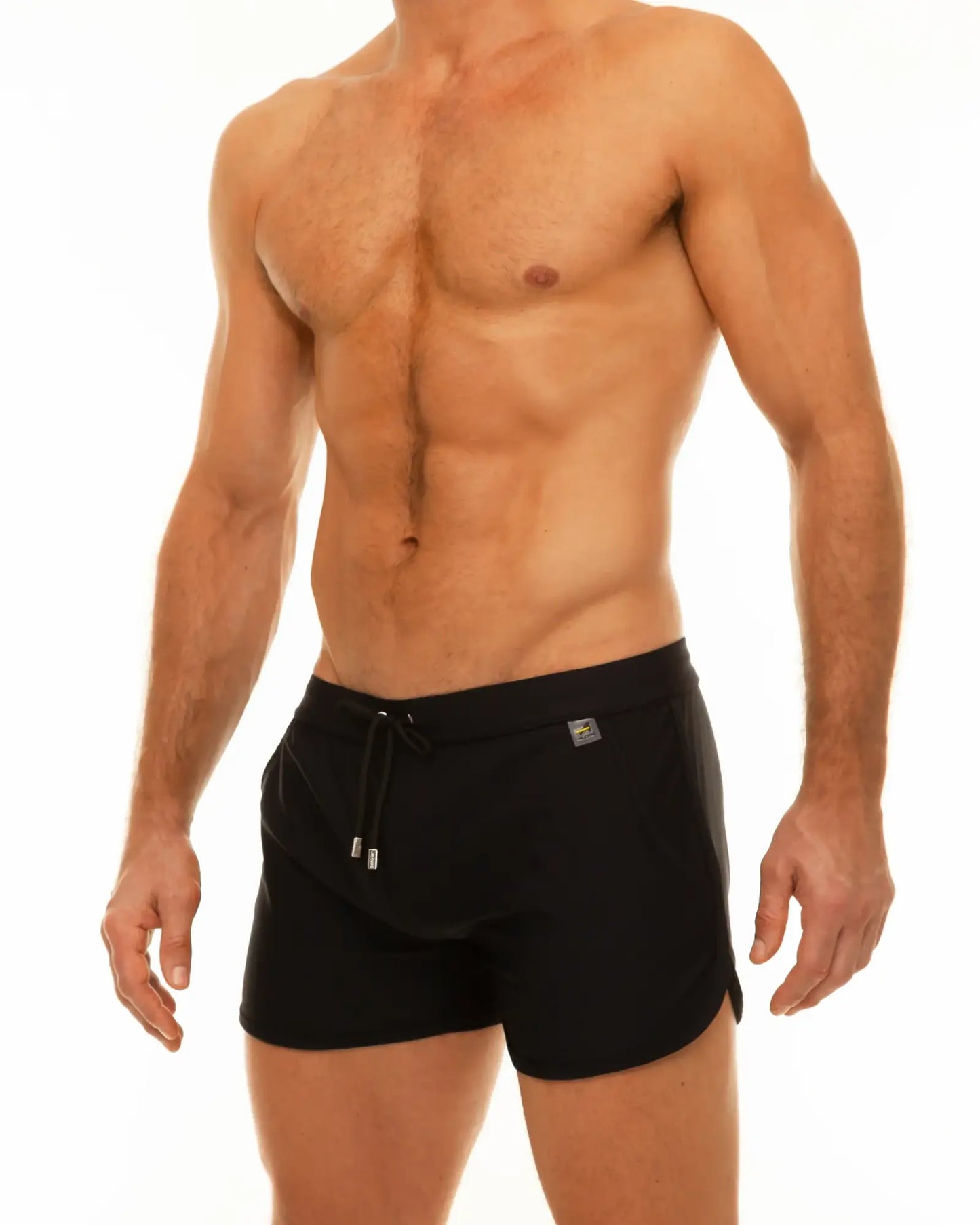 Black along slit swim short trunks with drawstring waistband and small metallic logo on the side