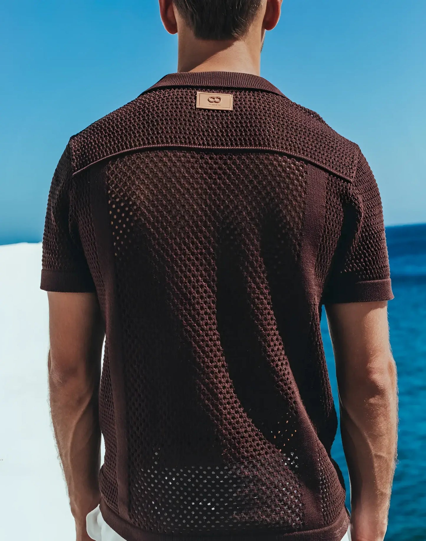 Amafi knit shirt brown textured knit polo shirt with subtle woven pattern and small leather brand tag at collar
