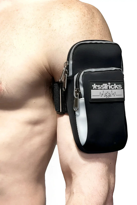 Black and gray sstricks arm bag with zippered compartments and reflective stripe for secure storage during workouts
